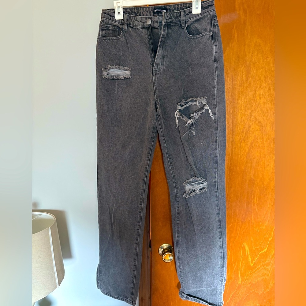 Distressed black PLT jeans